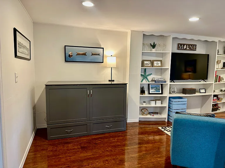 Murphy bed cabinet with queen sized trifold foam mattress with plenty of space for set-up