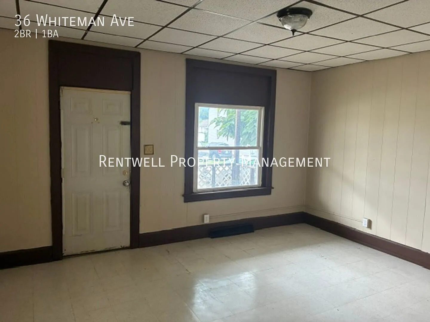 Charming 2-Bedroom Home with Front Porch & Backyard — Photo 3