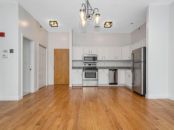 Kitchen, closet, and front door