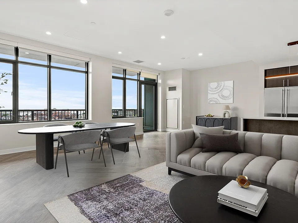 Penthouse kitchens feature quartz countertops and breakfast bars