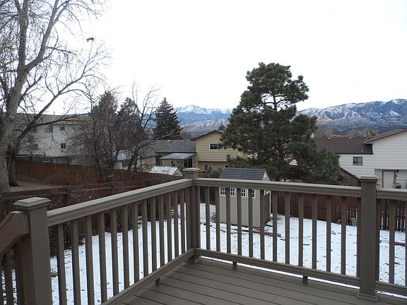 composite deck with mountain views and shed