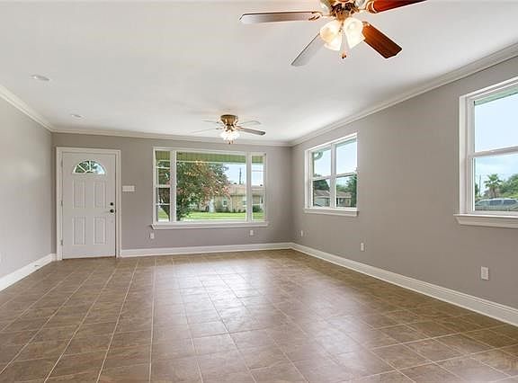 612 Ermine Dr. Arabi, LA  70032 -- Lots of light and space in the living room.