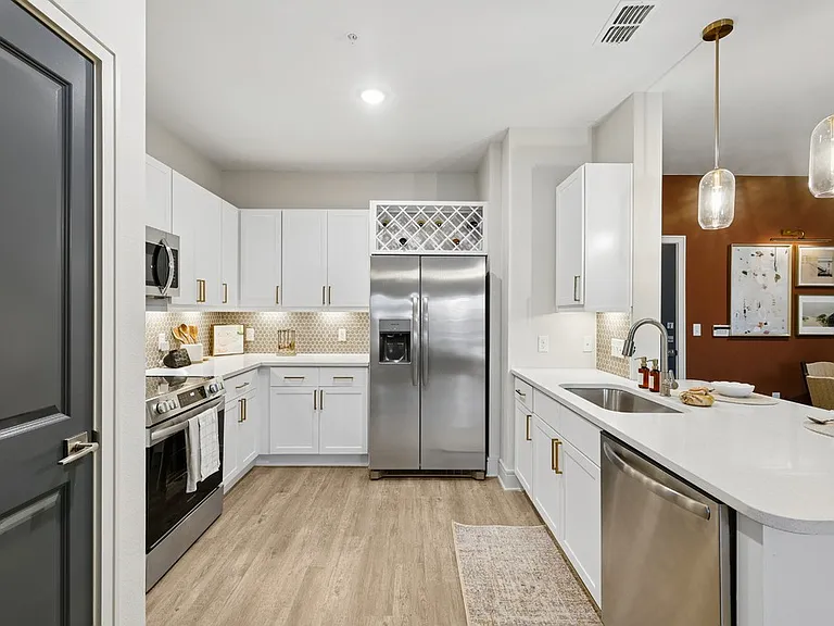 Kitchen with Quartz Countertop and Stainless Steel Appliances