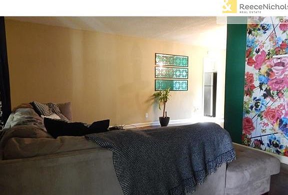 New art wall in living room area. Seller will remove and paint if its not your thing...