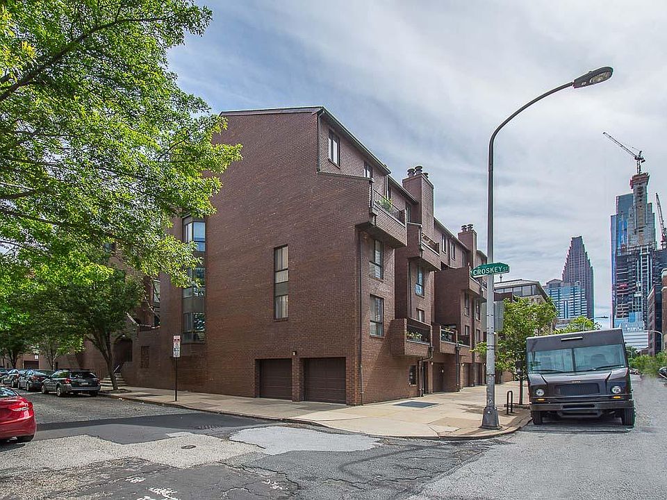 street view of corner bottom unit (garage on left is attache