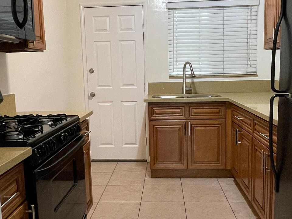 Generous sized kitchen with stove, microwave and refrigerator.