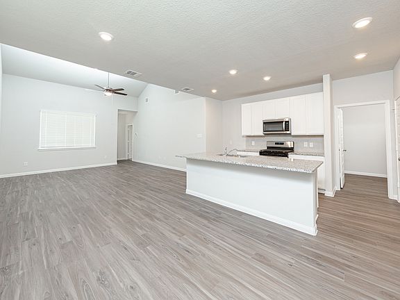 Dining Area to Kitchen and Family Room