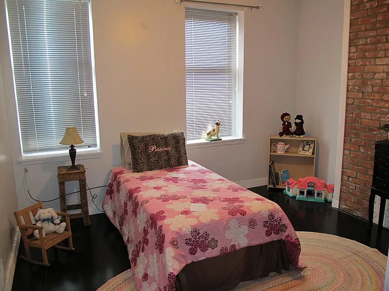 Second floor: Bedroom #1 (unfurnished, two closets)
