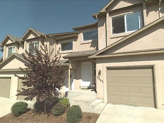 Closeup of front of the building, all landscaping paid.