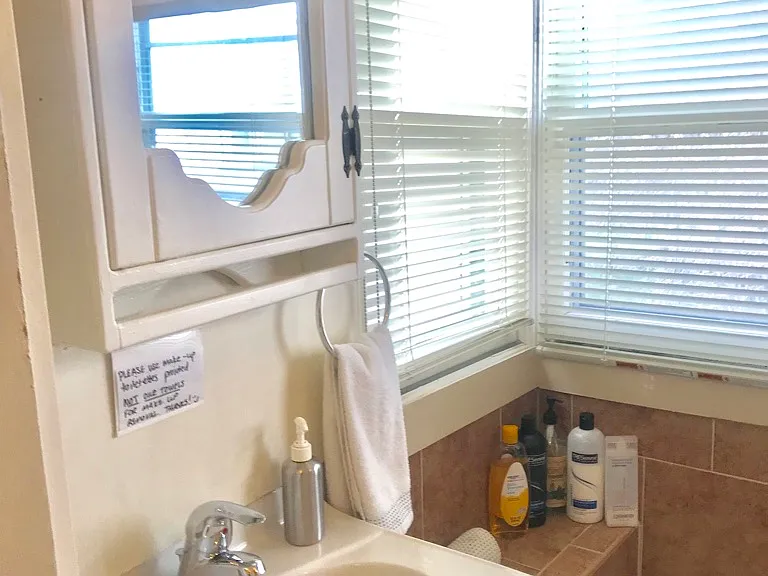 Bathroom off of bedroom is very small, so very European!
