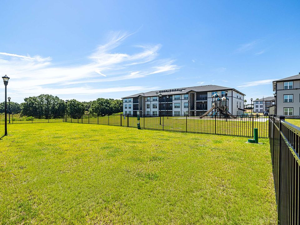 Fenced community dog park at The Groves at Lake Juliana
