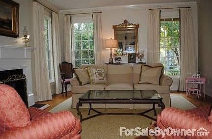 Formal Living
						:
						Features Fireplace, Hardwood Floors, 4 Large Windows