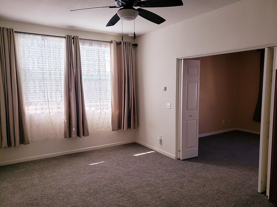 Living room with French doors into bedroom