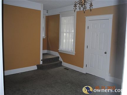 Front Living Room showing entry and stairs