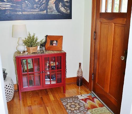 The foyer greets you with beautiful hard wood flooring and a large front coat closet.