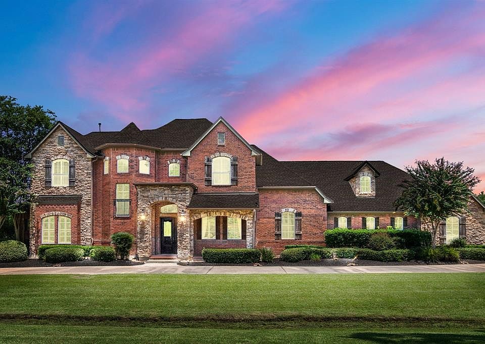 Welcome to 14 Gleannloch Estates Drive, a gorgeous 5 bedroom, 4.5 bath custom home in prestigious Estates section on almost an acre lot.