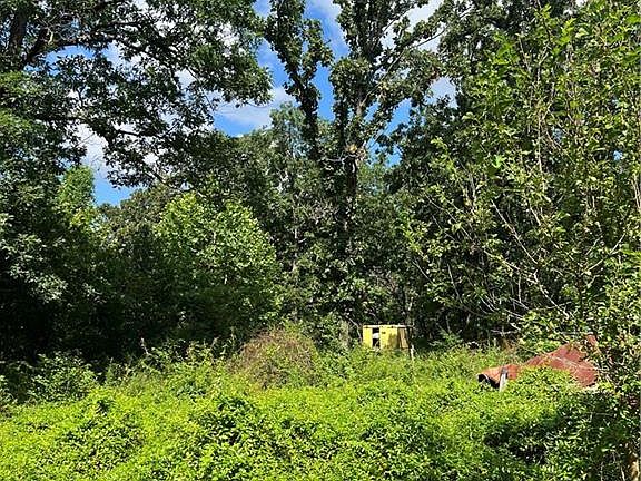 3rd image of 647 NE 185 Pvt Rd