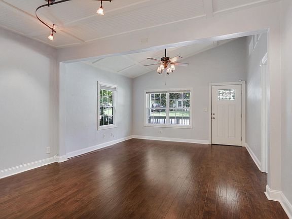 Family room looking back towards front door - lots of natura