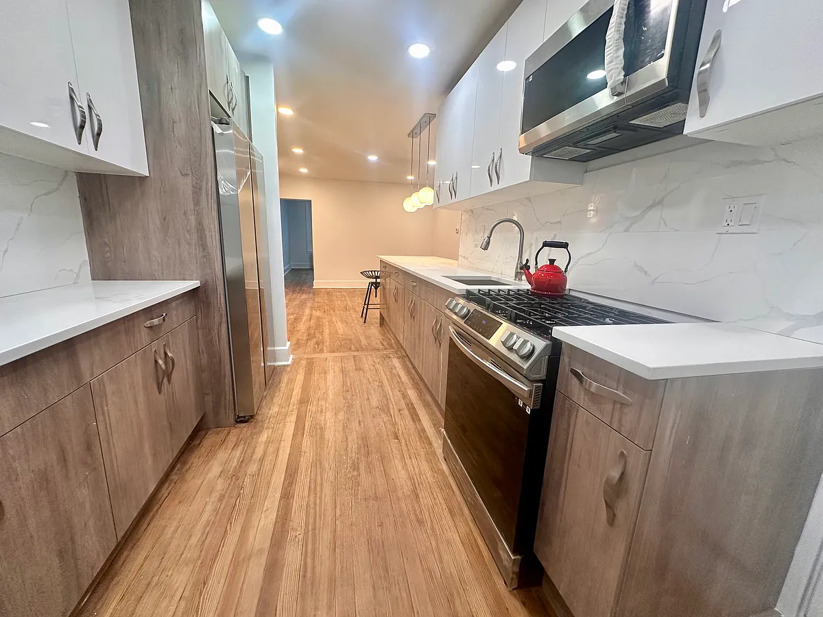 Updated kitchen with stainless steel appliances and new finishes. - 328 High St #2B