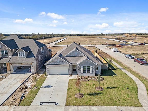 An ariel view of your corner lot, home and community.