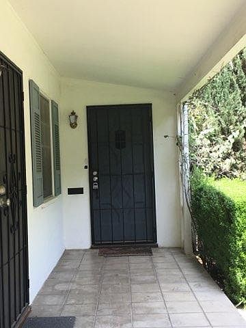 Front entrance. Security doors offer the feeling of security, but most importantly they let that afternoon breeze in!