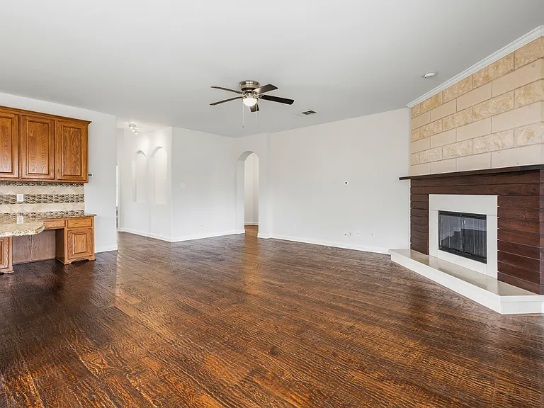 Living room with custom fireplace