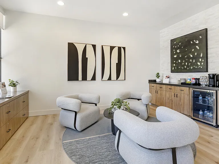 Our leasing office offers a cozy retreat with complimentary coffee and refreshing cool water, inviting you to relax and explore your new home sweet home.