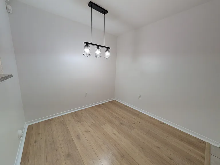 5001 Wiles Rd #105 — Photo 9
