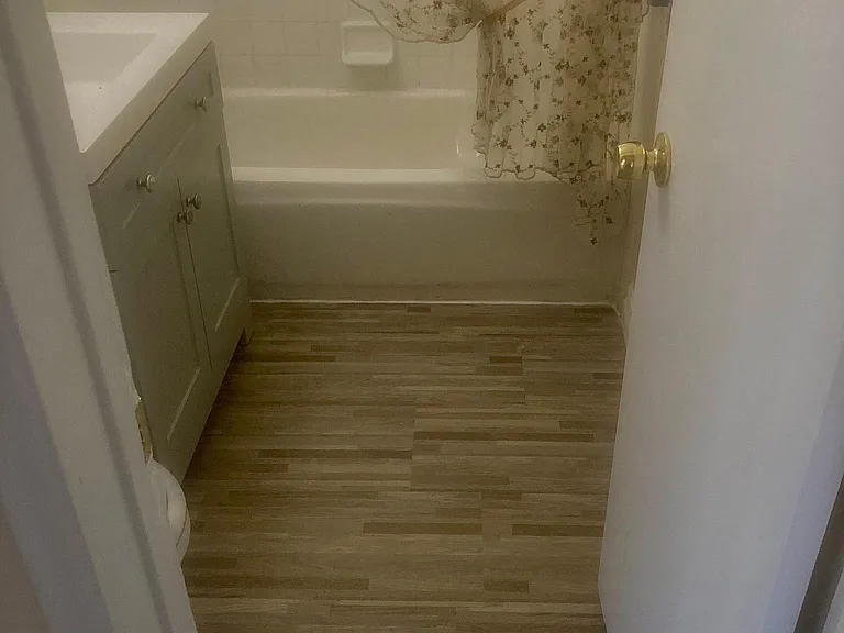 Bathroom, with new paint, floor and vanity with drawer
