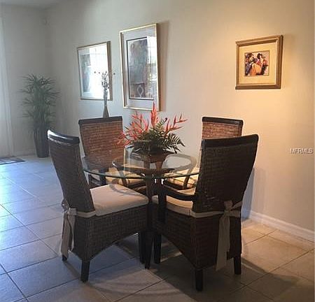 Dining area. Ceramic tile flooring throughout the 1st floor.