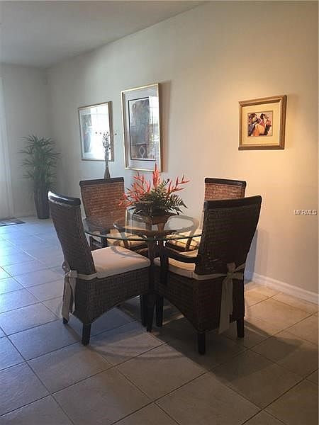 Dining area. Ceramic tile flooring throughout the 1st floor.