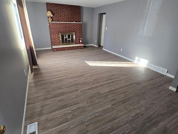 Living room with working fireplace