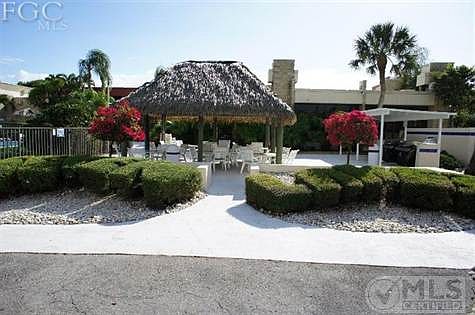 Tiki Hut next to main pool area, gas grills ready for owners use.  Have a party!