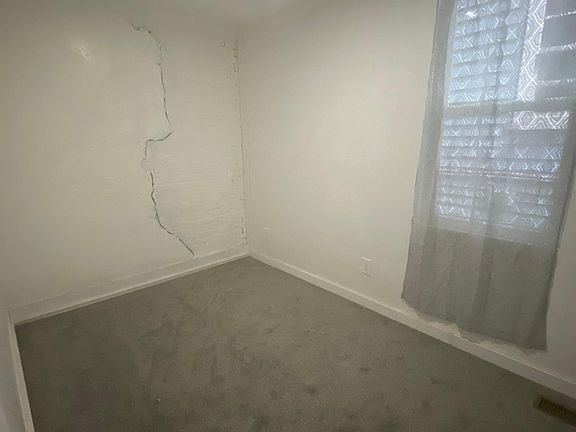 Bedroom #1 with brick wall aesthetic