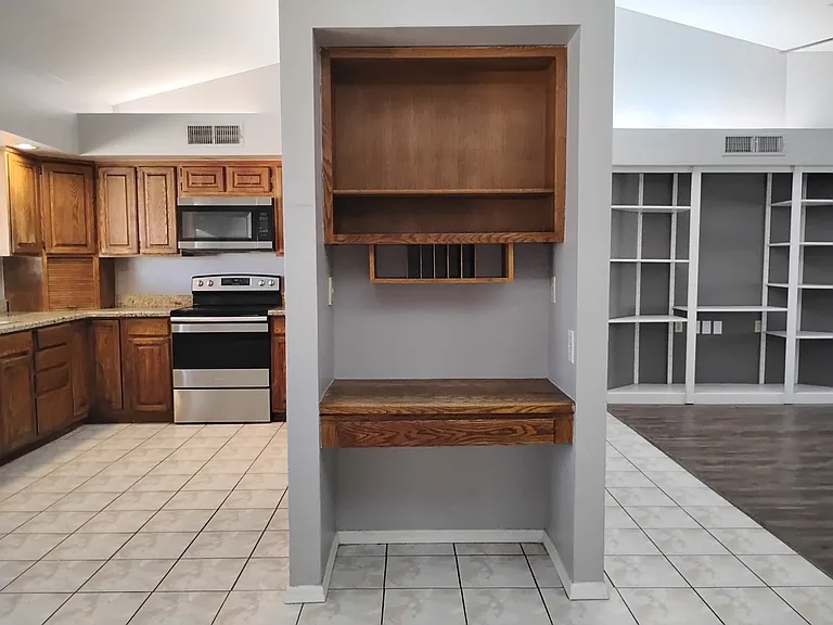Small computer area by the kitchen
