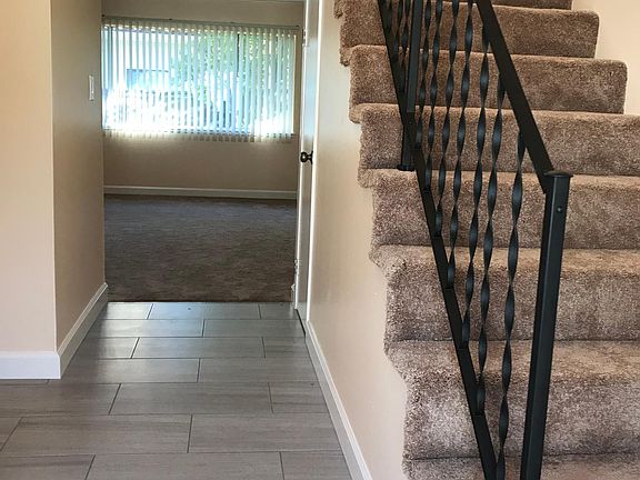 Entrance to the living room and stairs to the bedrooms