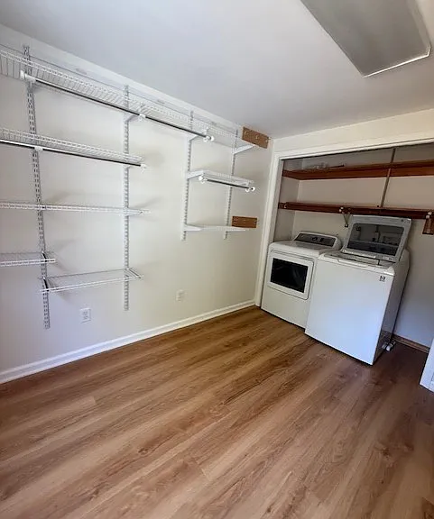 LARGE PRIMARY CLOSET WITH WASHER & DRYER