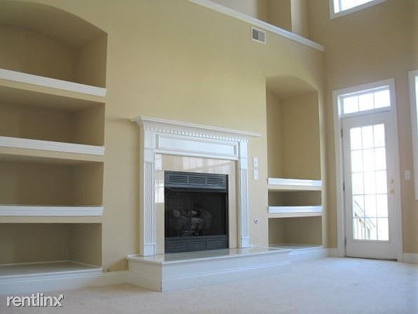 Huge, 2 story Living Room with gas Fireplace!