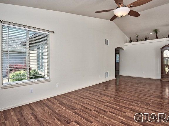 This home's vaulted ceilings are mated to plant shelves and a built-in alcove in