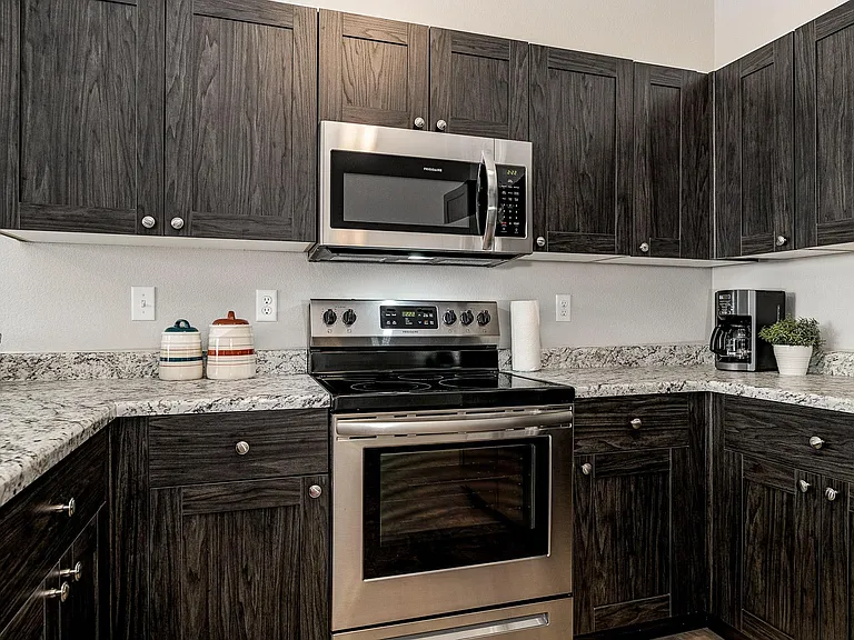 Kitchen cabinets and stainless steel appliances