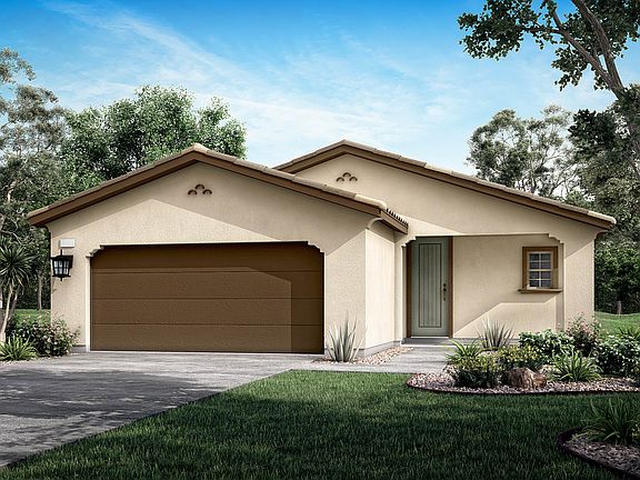 A single-story beige house with a brown garage door sits on a grassy lawn, surrounded by trees and s