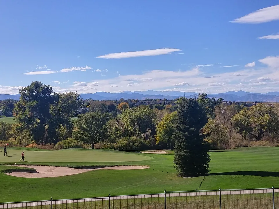 Mountain and golf course views out the front door, windows and patio.