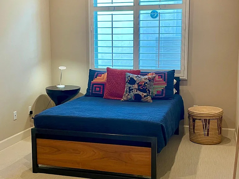 Simple, modern, uncluttered & elegantly furnished third guest/flex room with full-bed.