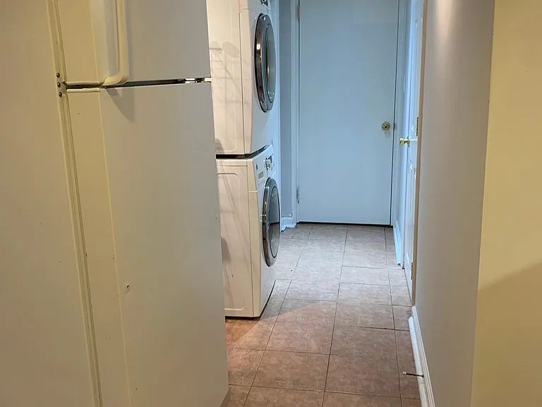 Fridge and washer dryer hall way