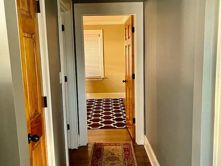 Downstairs hallway leading to bedroom 1