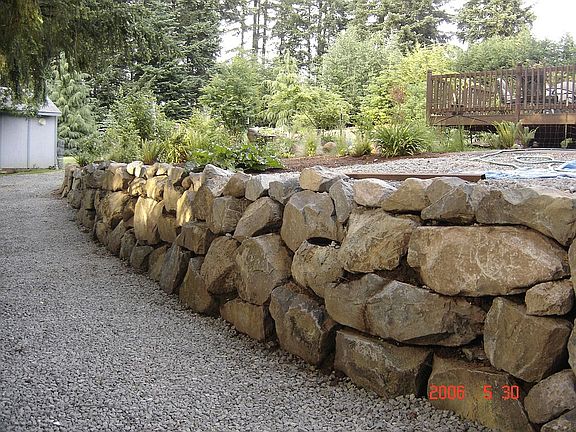 fron side of new wall and rear access driveway