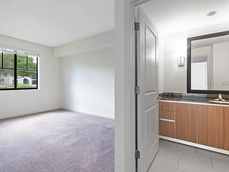 Enjoy a generously sized bedroom complete with a private ensuite bathroom and an expansive vanity