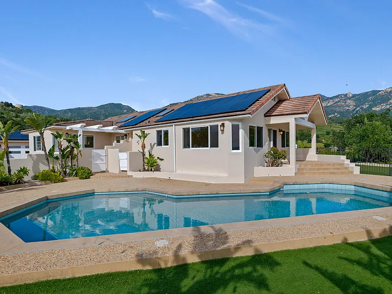 Back of Home With Pool