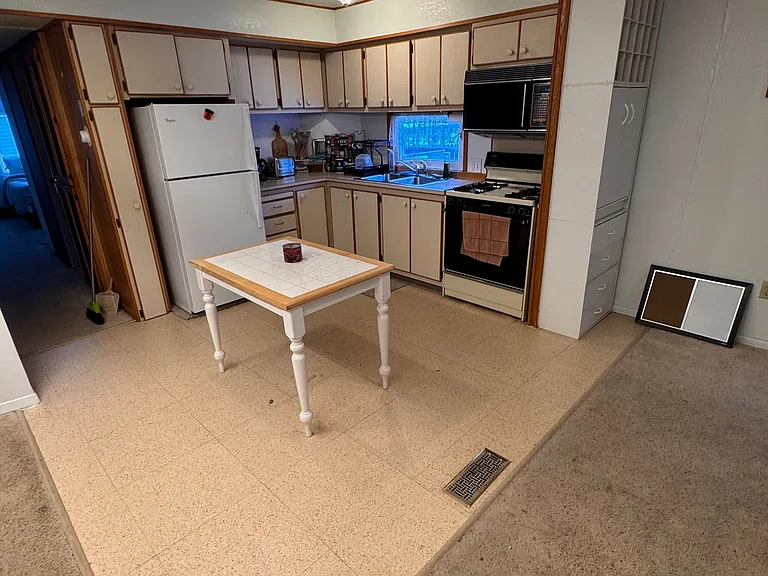 Please note *new oven and microwave (not pictured)