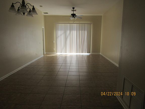 Family room leads out to the large screen enclosed porch
